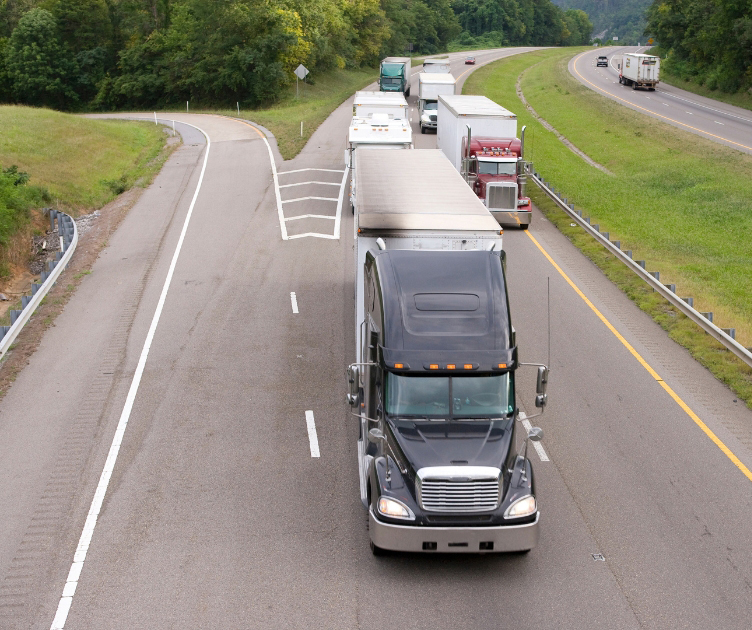 Experienced Buchanan CDL-A dry van driver hauling enclosed freight on a company driver route.