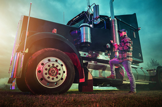 Buchanan Hauling company driver representing health, retirement, paid time off, and driver benefit opportunities.