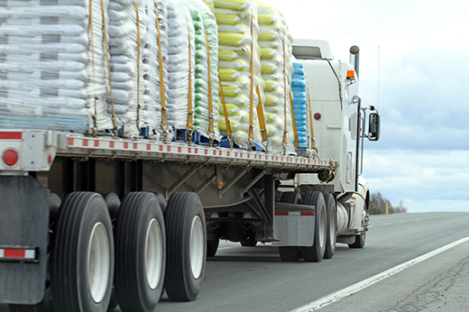 professional CDL-A truck driver operating semi truck on highway